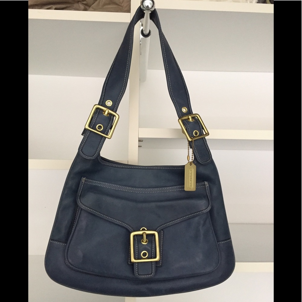 Classic Coach blue saddle bag with gold accents